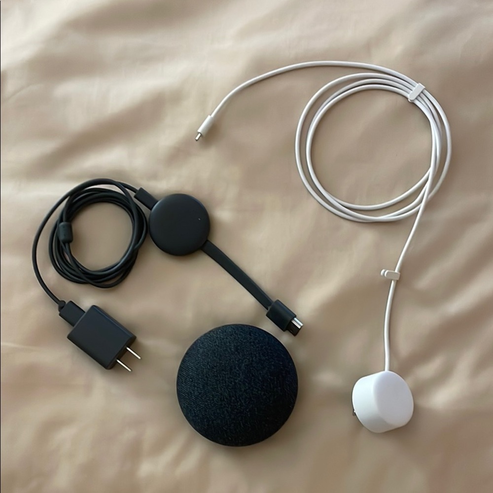 Google Nest Mini in charcoal with Chargers